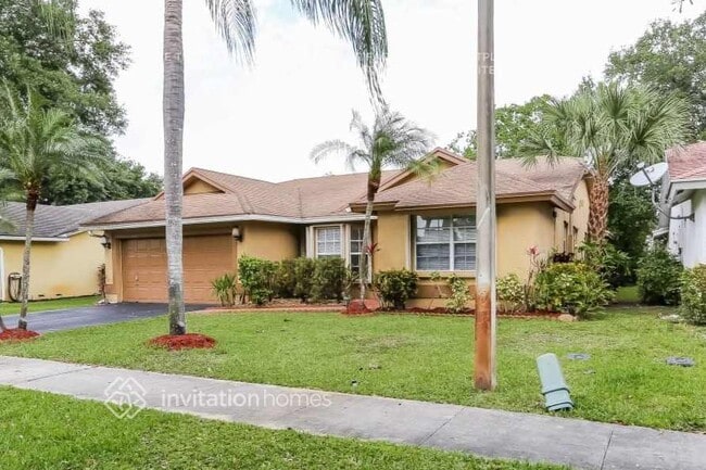 Building Photo - 9575 NW 25th Ct