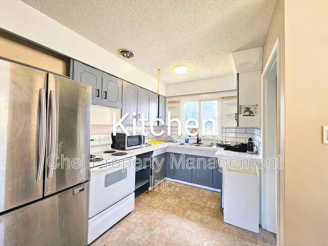 Building Photo - 8007-128A 128a Ave NW