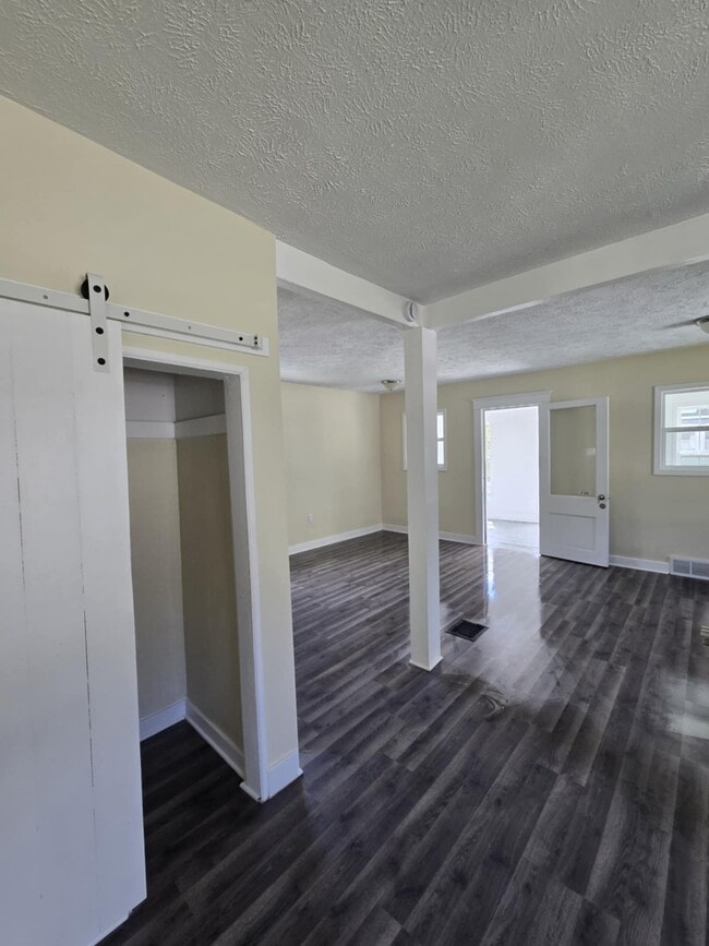 Dinning room area/front of living room and living room storage closet - 826 Clayton St