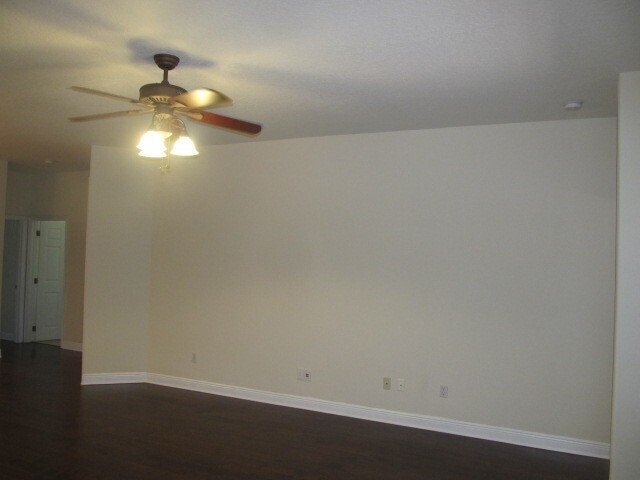 Building Photo - PRISTINE 3/2 one story home in gated commu...