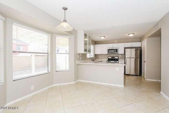 Building Photo - 9919 W Meadowbrook Ave