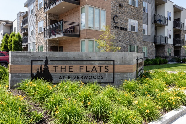 Building Photo - The Flats at Riverwoods