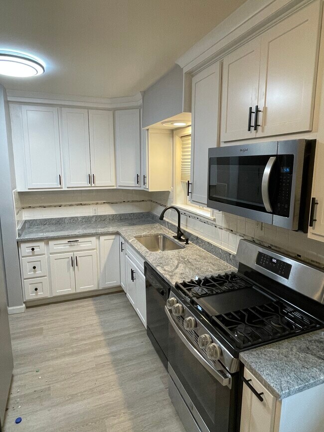 Kitchen with NEW Cabinets, Granite, Stove, Floor, etc - 8100 Balson Ave