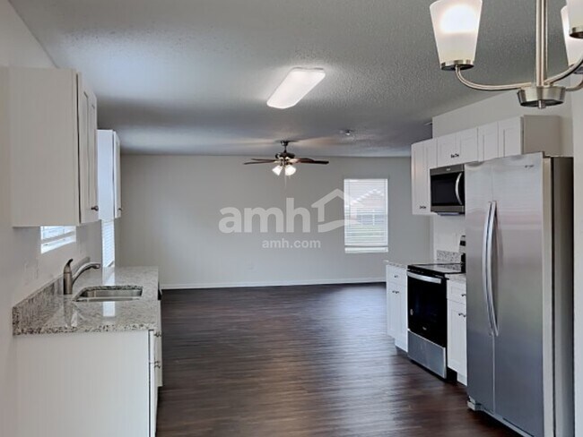 Foto del edificio - 10413 Woodruff Ct