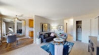 Located at 822 W A St in Hayward, California, this single-floor residence offers a thoughtfully designed layout that balances comfort and functionality. The open-concept living area is carpeted and filled with natural light, anchored by a large decorative mirror and sliding glass doors that lead to a private fenced patio — ideal for relaxing or casual outdoor dining. A dedicated dining nook sits adjacent to the living space, framed by large windows with outdoor views, creating a bright and welcoming atmosphere for meals. The kitchen is well-appointed with warm honey-toned wood cabinetry, granite-style countertops, a stainless steel sink, and a dishwasher, all set atop durable wood-look flooring. The bedroom is generously sized with plush carpeting, a walk-in closet, and a large window that allows ample natural light to filter in, lending the room a calm and restful quality. The bathroom features wood-look tile flooring, a full bathtub and shower combination, and a vanity with countertop storage. Throughout the residence, neutral tones and clean finishes create a cohesive, move-in-ready aesthetic that is both practical and inviting.