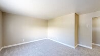 Located at 4934 San Juan Ave in Fair Oaks, California, this single-floor, 2-bedroom, 1-bathroom home offers a straightforward and functional layout across a compact yet well-utilized footprint. Neutral warm-beige walls and clean white trim run throughout, creating a consistent and cohesive aesthetic.

The kitchen is efficiently designed with white shaker-style cabinetry, light granite-look countertops, a stainless steel sink, and white appliances including a gas range and dishwasher. Light wood-look flooring extends through the kitchen and living area, where a wall-mounted heater and ceiling light fixture are also present.

Both bedrooms feature plush gray carpeting and neutral-toned walls, offering a quiet and comfortable retreat. Natural light enters through horizontal sliding windows, and one bedroom includes a mirrored sliding-door closet. An additional closet provides further storage. The hallway connects the main living areas to the bedrooms and bathroom.

The bathroom is cleanly finished with light flooring, a pedestal sink, a full soaking tub with shower, and a small window for natural ventilation and light. A mirror with overhead lighting completes the space. Overall, the home presents a clean, move-in ready environment with a practical and well-organized floor plan.