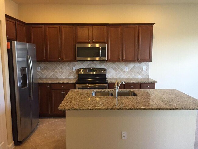 Foto del edificio - 10217 Wellington Parc Dr