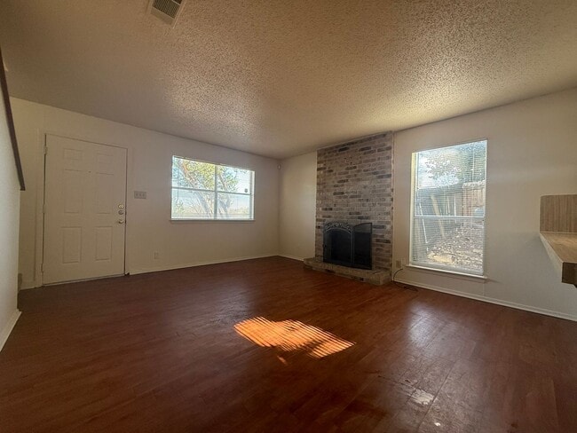 Building Photo - Wood Properties1 (8102 Dunn St)