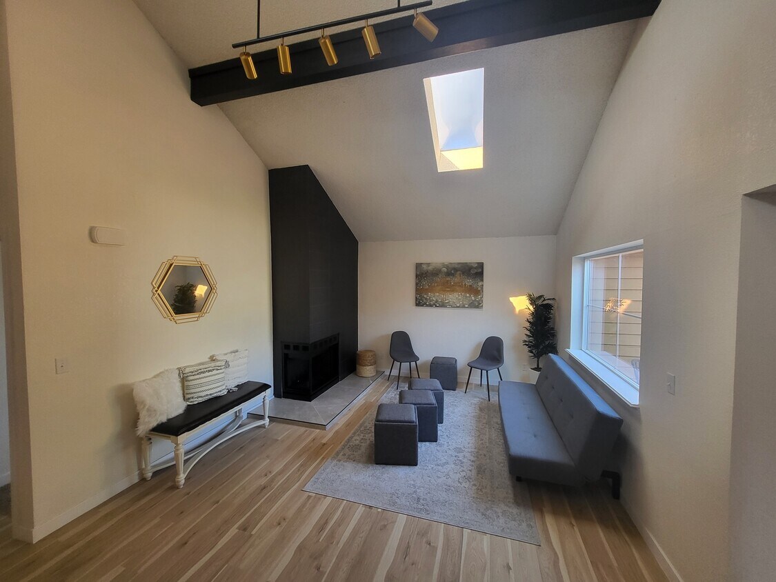 Living Room with fireplace - 9170 W 88th Cir