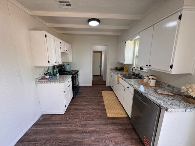 Photo - Brand New inside, great neighborhood and large fenced yard!  Call us today to make this your new ... House