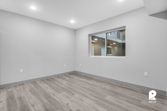 Building Photo - 7040 Woodman Ave