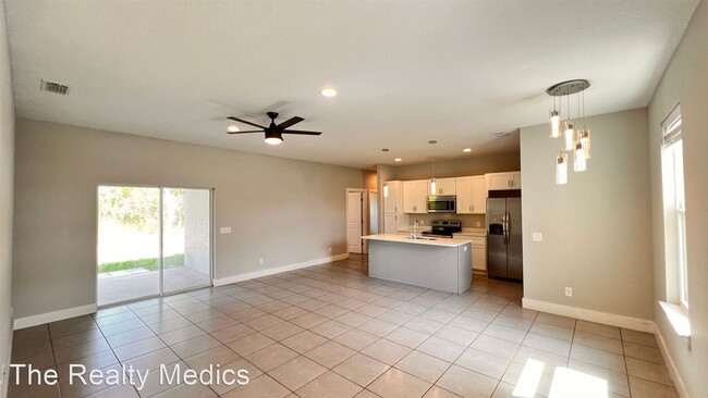 Building Photo - 4 br, 2 bath House - 9 Orchid Ln