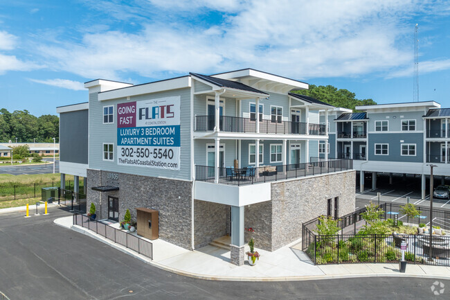 Building Photo - The Flats at Coastal Station