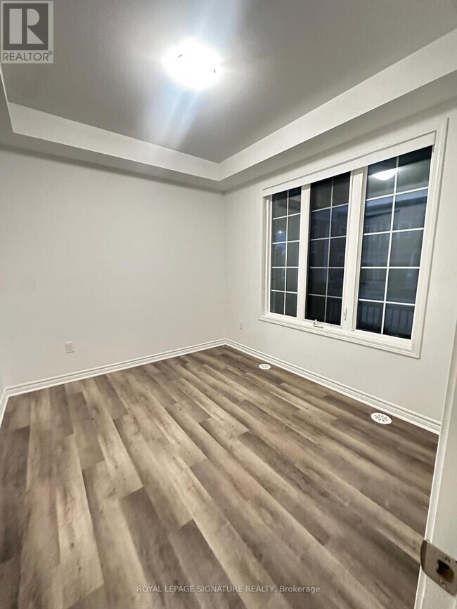 Photo du bâtiment - 1259 Lily Cres