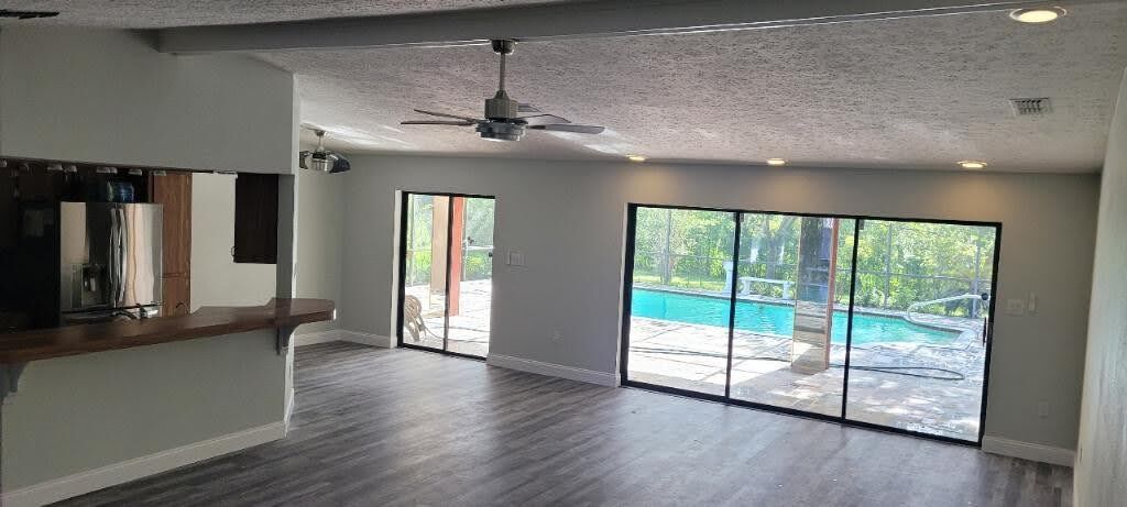 Livingroom pool view - 5239 Suwannee Rd