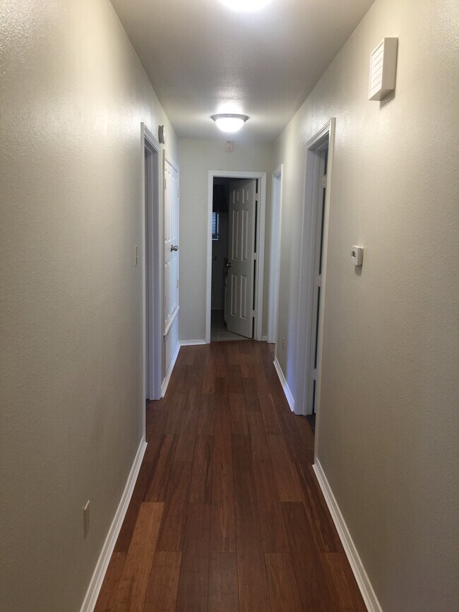Hall to bedrooms and guest bath - 215 Bob White St