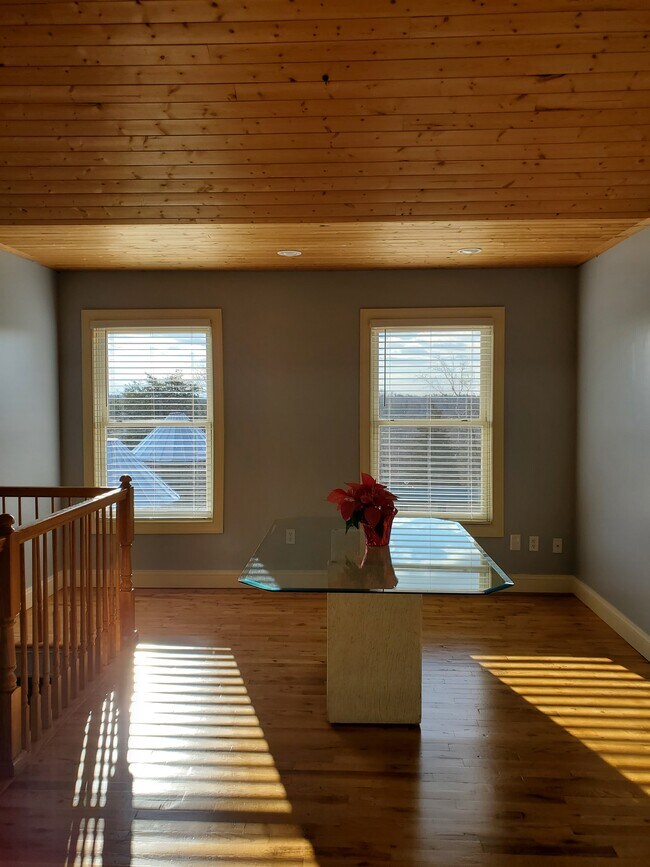 Dining area with table available - 227 Retriever Ln