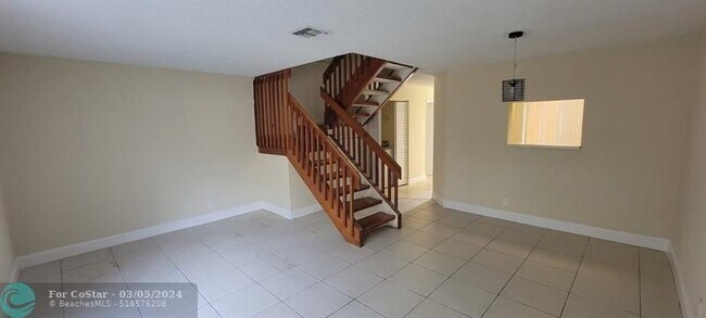 Building Photo - 11417 Royal Palm Blvd