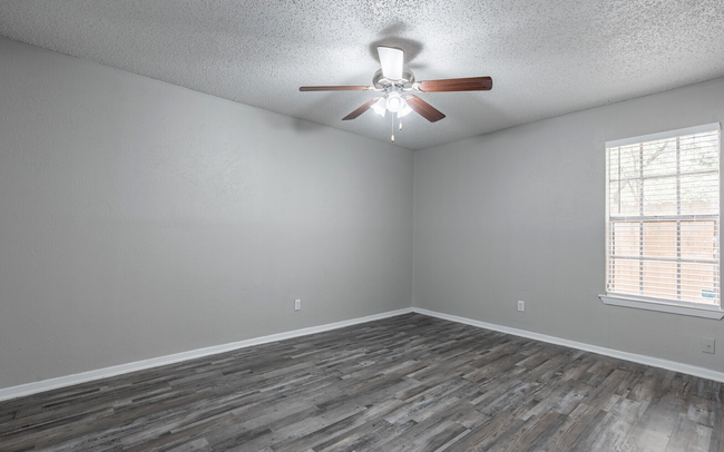 Bright and airy, this bedroom offers the perfect retreat at the end of the day. - Arbor Park Apartments