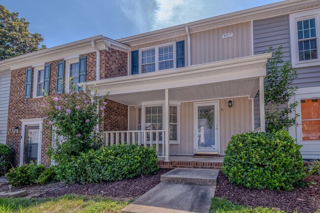 Building Photo - Freshly Updated 2 Bedroom Townhome with Fenced Outdoor Space – Convenient Greensboro Location