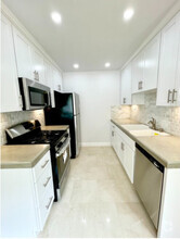 Full Kitchen w/ stainless steel appliances - 1619 Brockton Ave