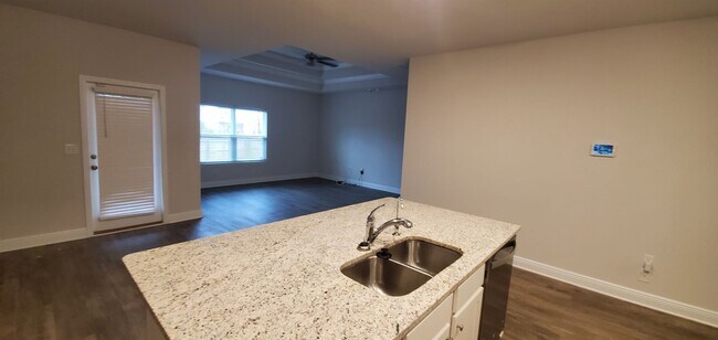 Building Photo - Modern 4Bed/2Ba Home w/Conveniently Accessible Location in PCB! *Garbage Service & Lawncare Inclu...
