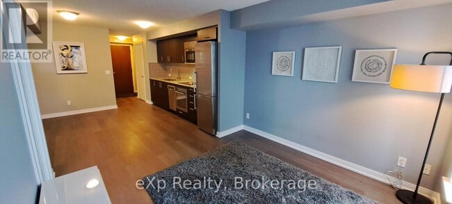 Building Photo - 255 Village Green Square