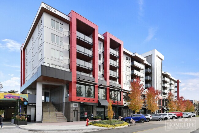 Photo du bâtiment - Modern 1 Bedroom + Den at The District at Willoughby Brand-New, Stylish and Ideally Situated in L...