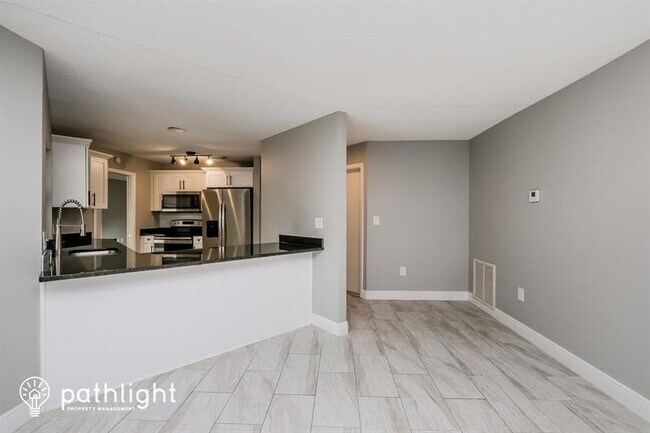 Building Photo - 7720 Gibralter Ct N