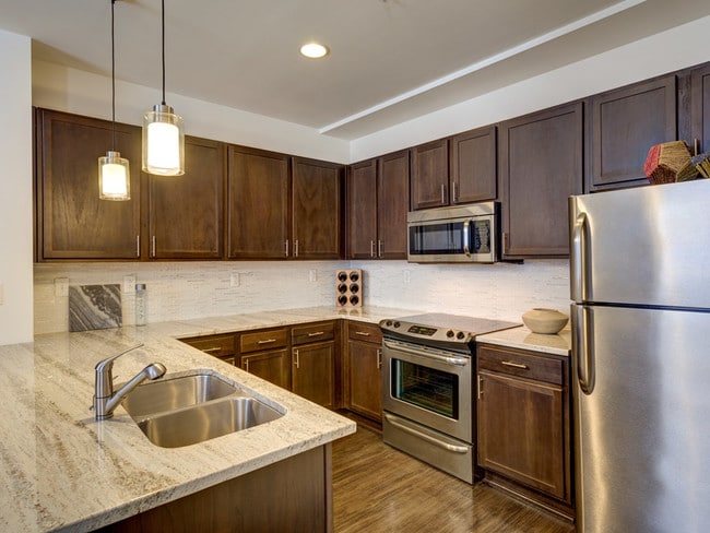 Lavish Quartz Countertops and Sleek Glass Top Ranges - (Transitioned)The Wainwright