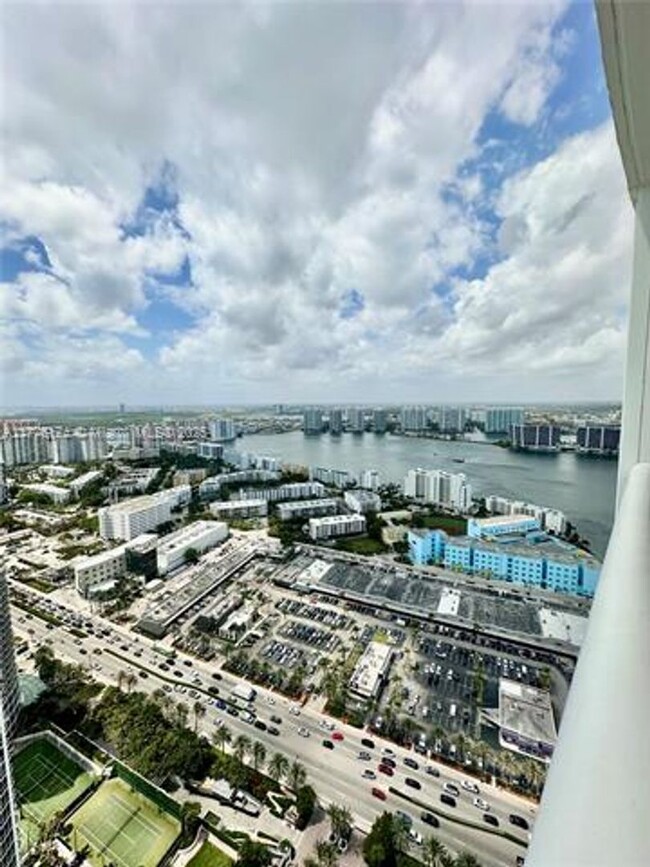 Building Photo - 18201 Collins Ave