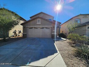Building Photo - 42065 W Hillman Dr