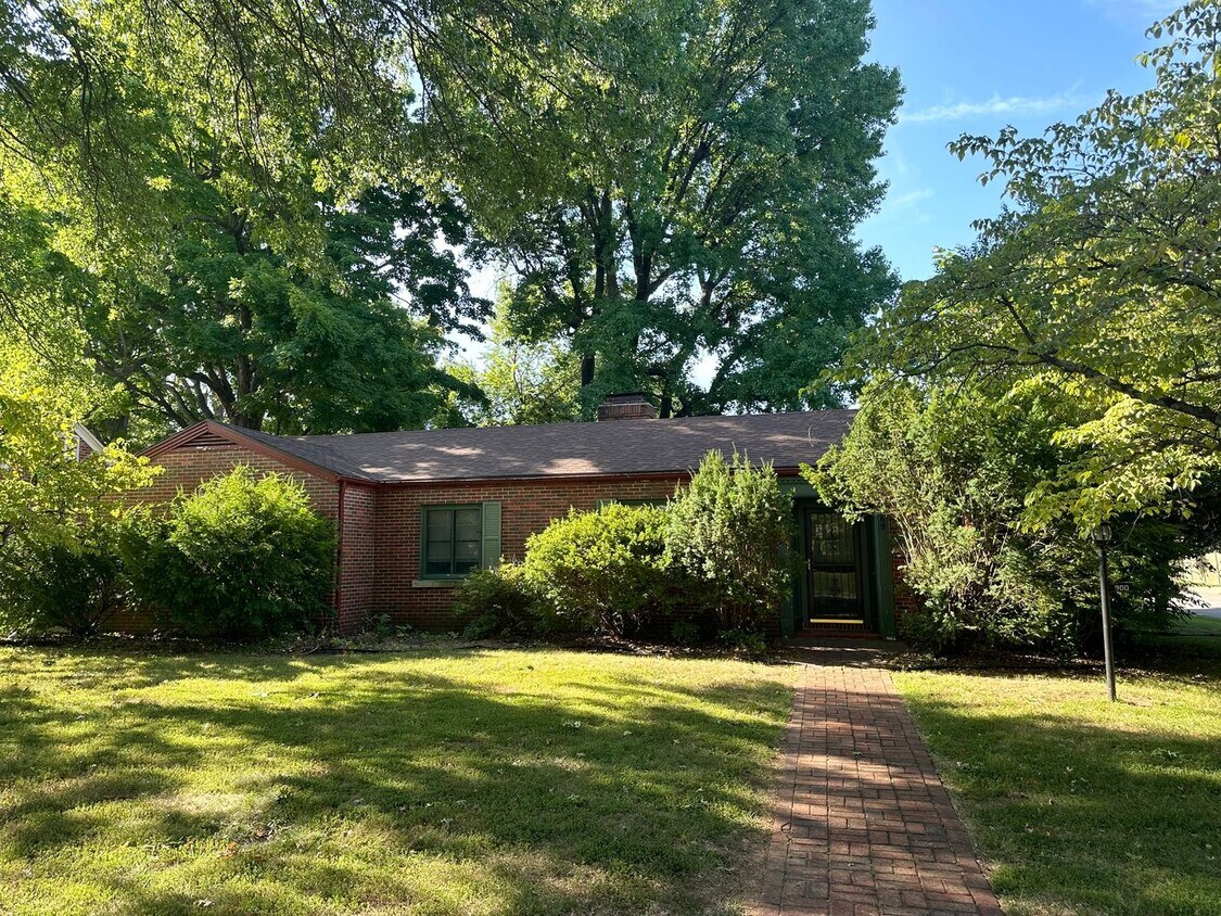 Primary Photo - Classic All-Brick Home with Cozy Fireplace...
