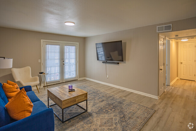 1BR, 1BA - 710SF Living Room - Indigo Villas