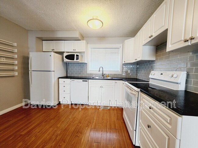 Building Photo - 5555-144A 144a Ave NW