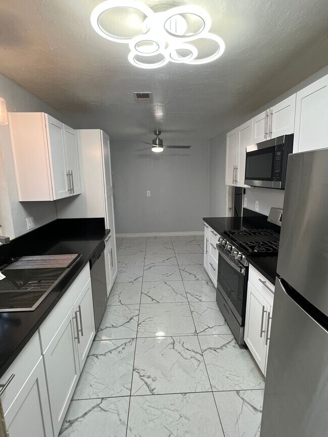 Building Photo - Huge 2 story 8 bed room Home: a hop and a ...