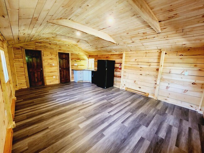 Building Photo - Amazing Cabin with hand Milled Wood right ...