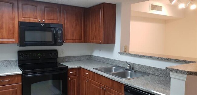 Building Photo - 5025 Wiles Rd