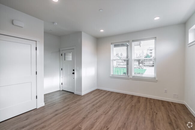 3BR, 2.5BA - 1,553SF - Living Room - City Townhomes