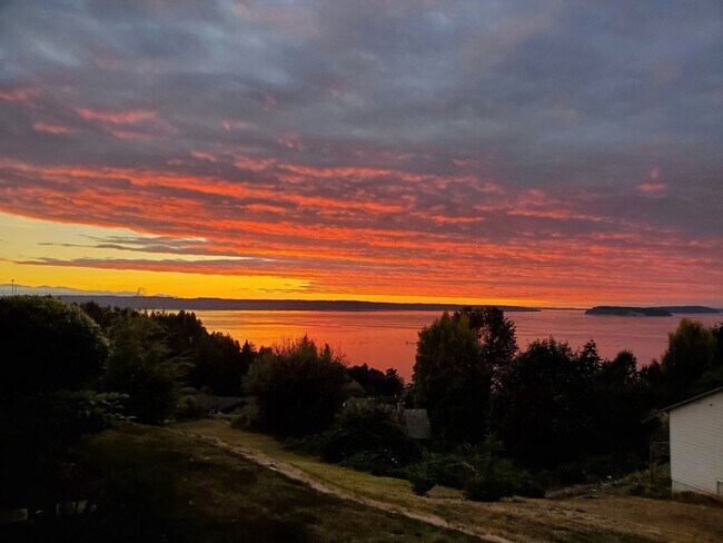 Building Photo - Modern 4-Bedroom Home with Panoramic Water & Mountain Views