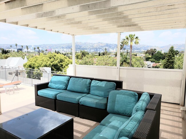 Rooftop Pool Lounge - 6151 Orange St