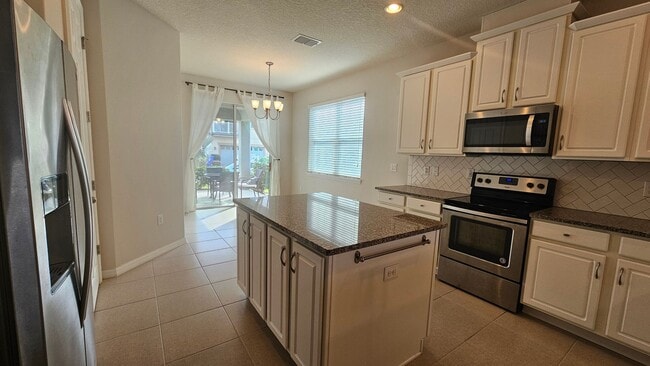 Building Photo - Immaculate Home in Guard Gated Community with Resort Style Amenities