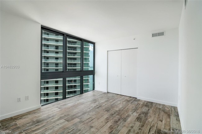Building Photo - 1 br, 2 bath Condo - Paraiso Bay Condo