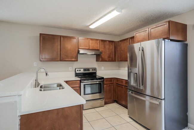 Building Photo - 7939 Cherry Blossom Dr S