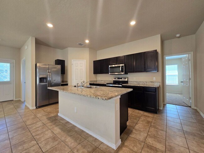 Building Photo - PRICE REDUCTION - NEW IN MANAGEMENT - AVAI...