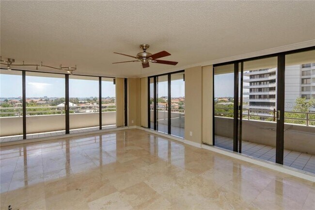 Building Photo - 5940 Pelican Bay Plaza S