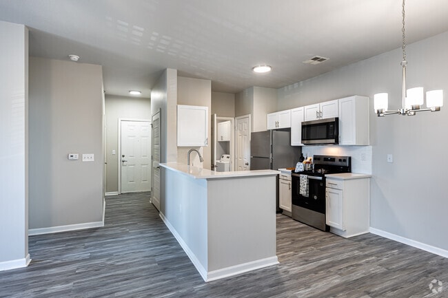 3BR, 2BA - 1,249SF Kitchen - The Fairways Apartment Homes