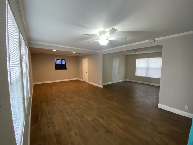 Living room open concept into dining and kitchen - 1220 E Llano Dr