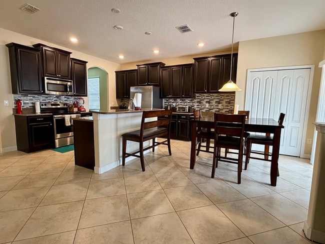 Photo - 3,261 SF Fully Furnished 5-Bed Gem | Just Bring Your Suitcase! Apartment