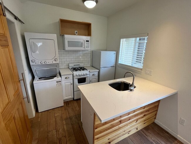 Building Photo - Guadalupe Studio With 1-Car Garage -- ALL ...